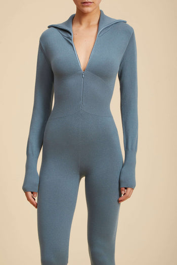Live The Process Column Jumpsuit. Zip codes. It's easy to go under cover in our zip up Column Jumpsuit featuring long sleeves and high collar.