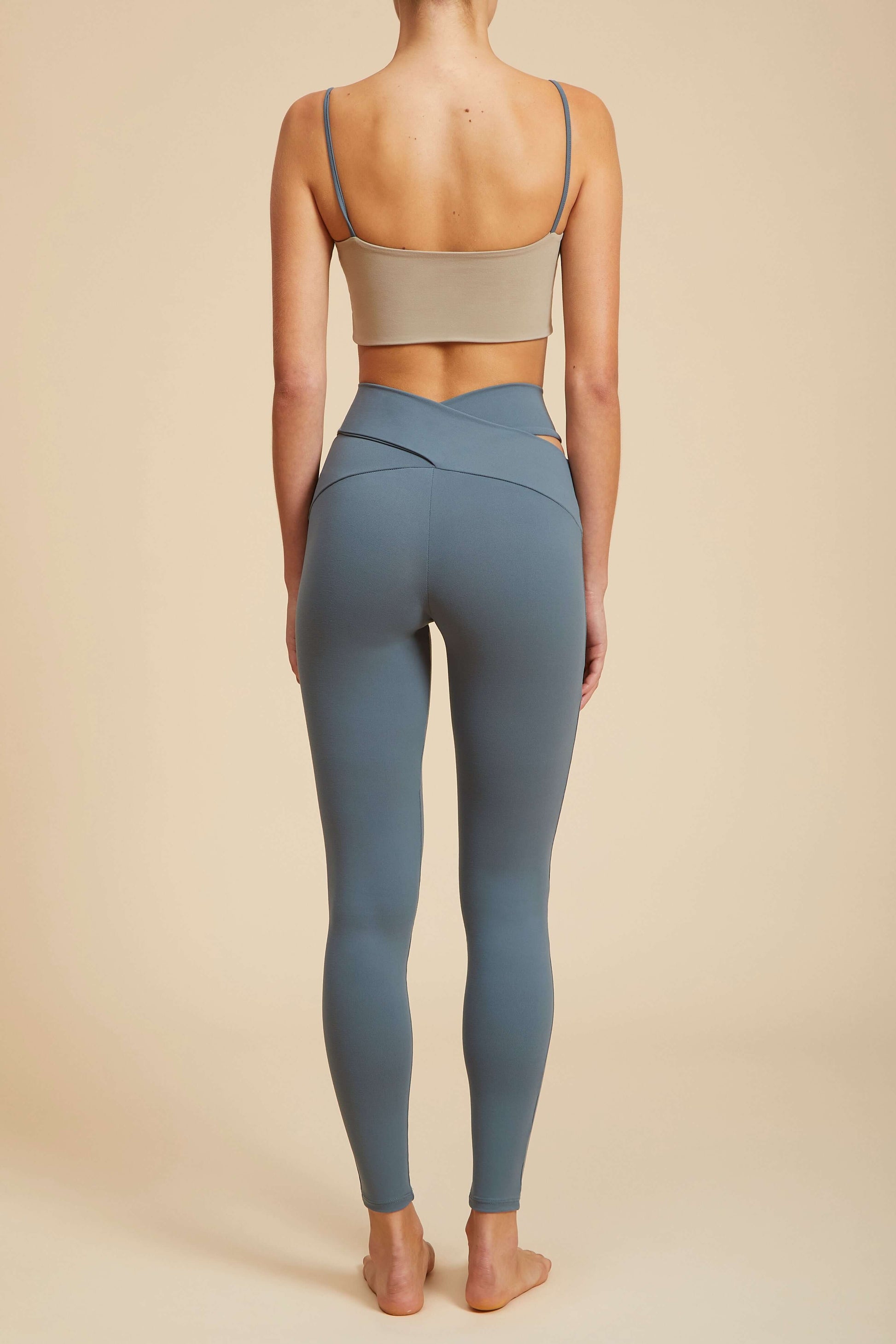 Live The Process Orion Legging. Over the moon. Truly, madly, deeply we're in love with our Orion Legging—our statement style featuring a criss-cross waist that works wonders on all bodies. Elegantly cut (and cut-out), your legs will thank us.