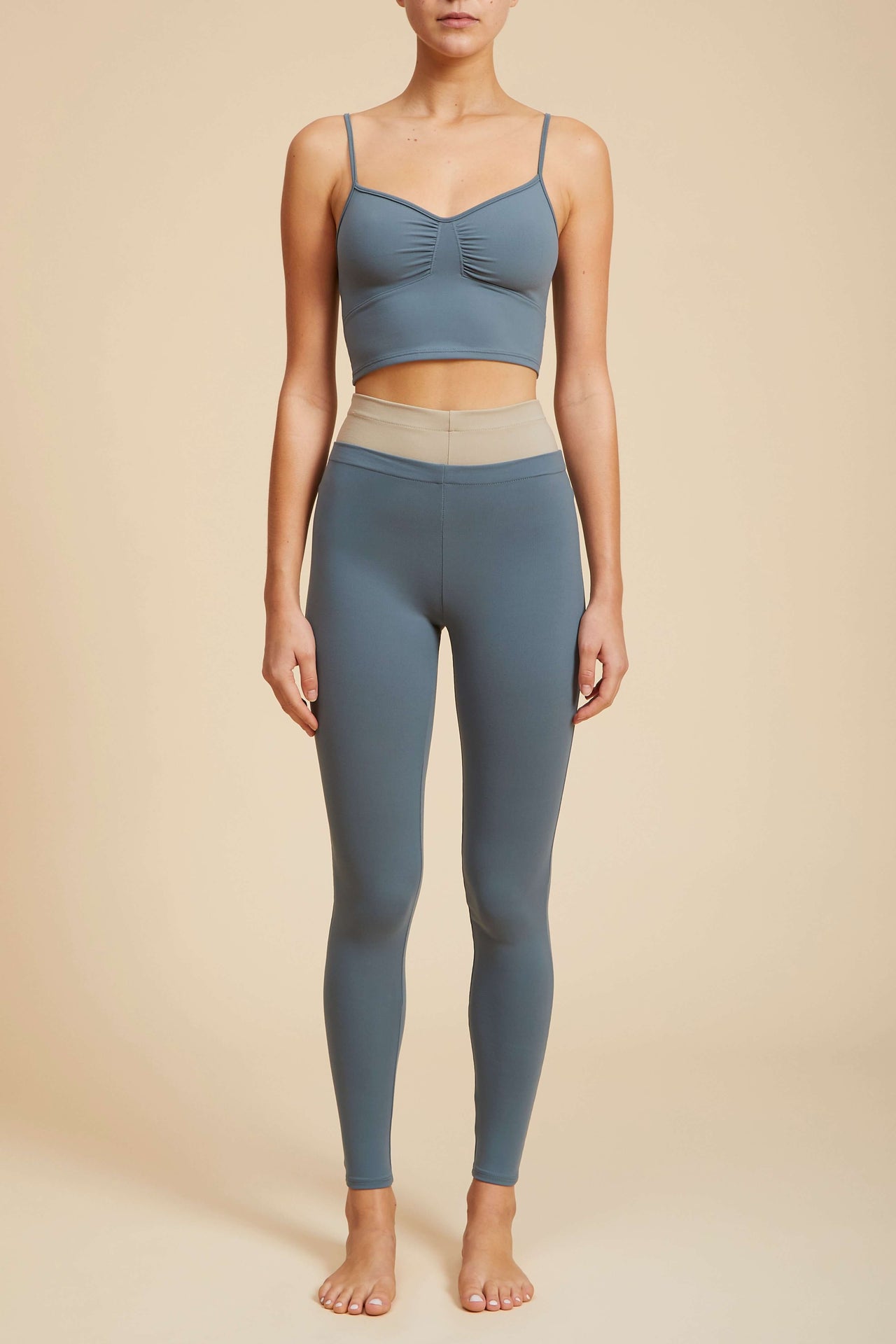 Live The Process Vega Top. Peak performance. Keep it simple in our supportive Vega Top, featuring ruching at the bust.