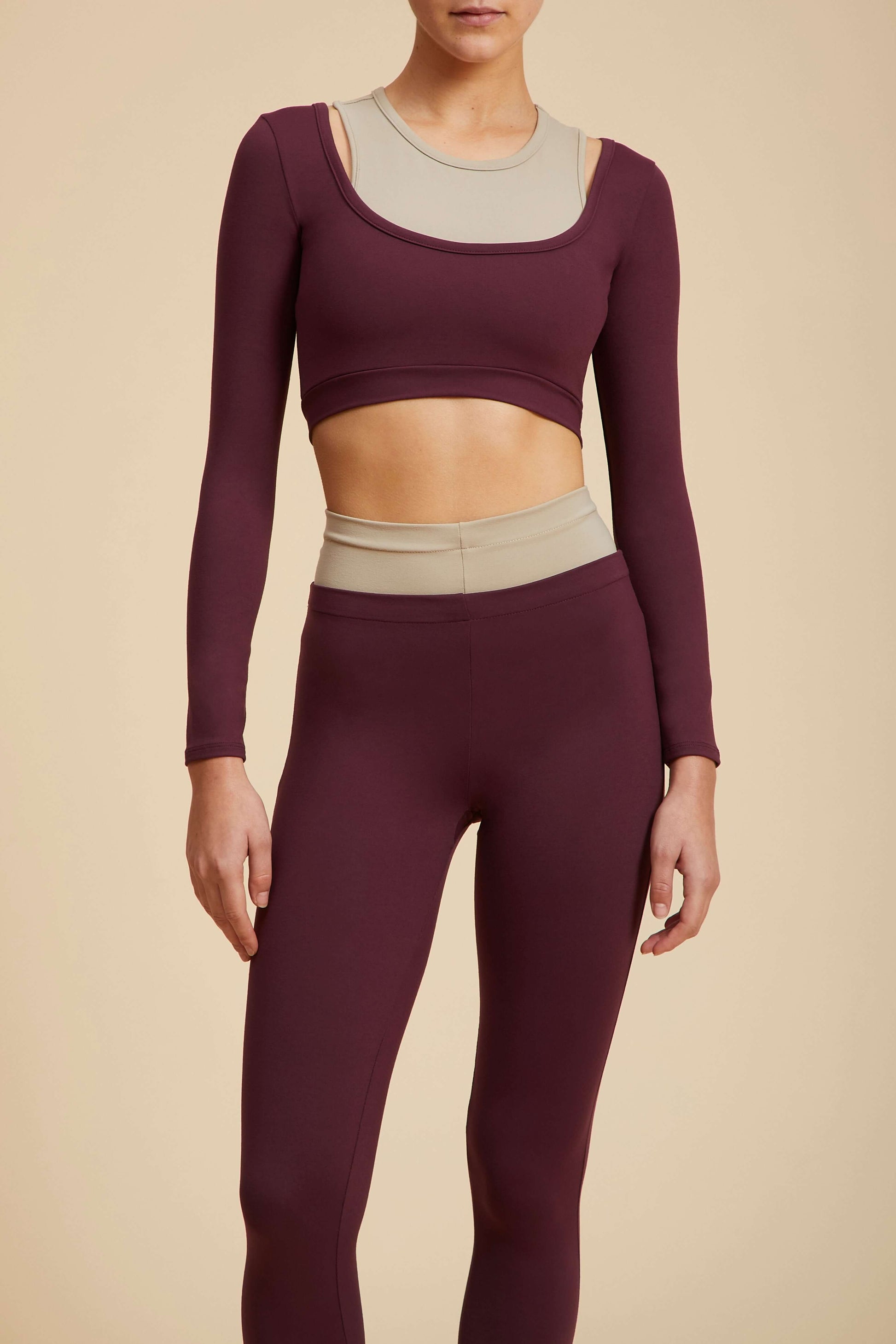 Live The Process Taurus Long Sleeve. March to the beat of your own drum in our sportswear-inspired Taurus Long Sleeve—a striking 2-in-1 in contrasting colors that doesn’t skimp on form or function. This fitted bra top features a wide scoop neck, a cropped